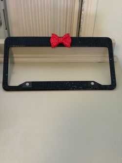 Black Rhinestone License Plate Frame with Red Bow Accent