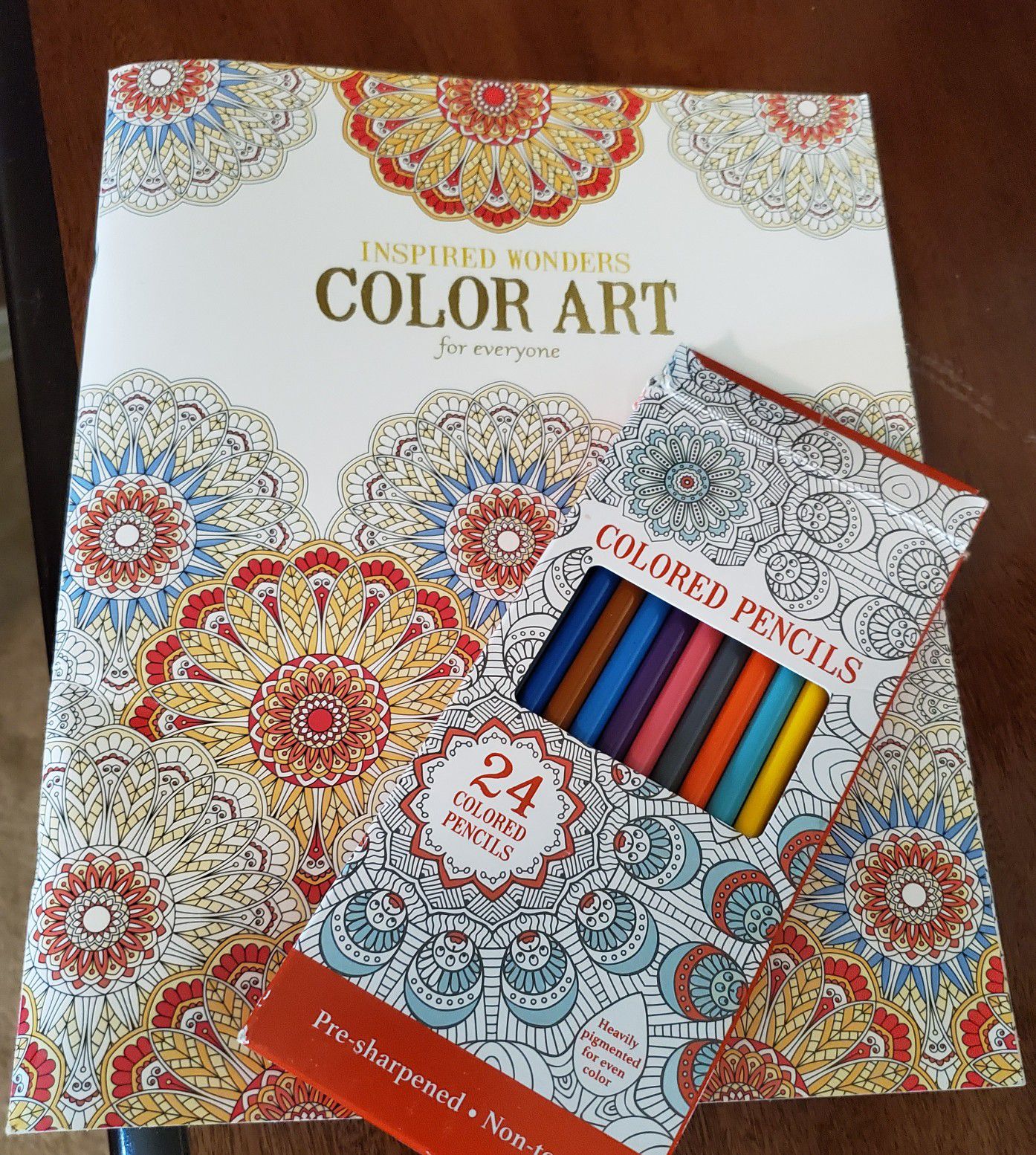 Art book and colored pencils