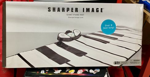 Sharper image giant piano mat