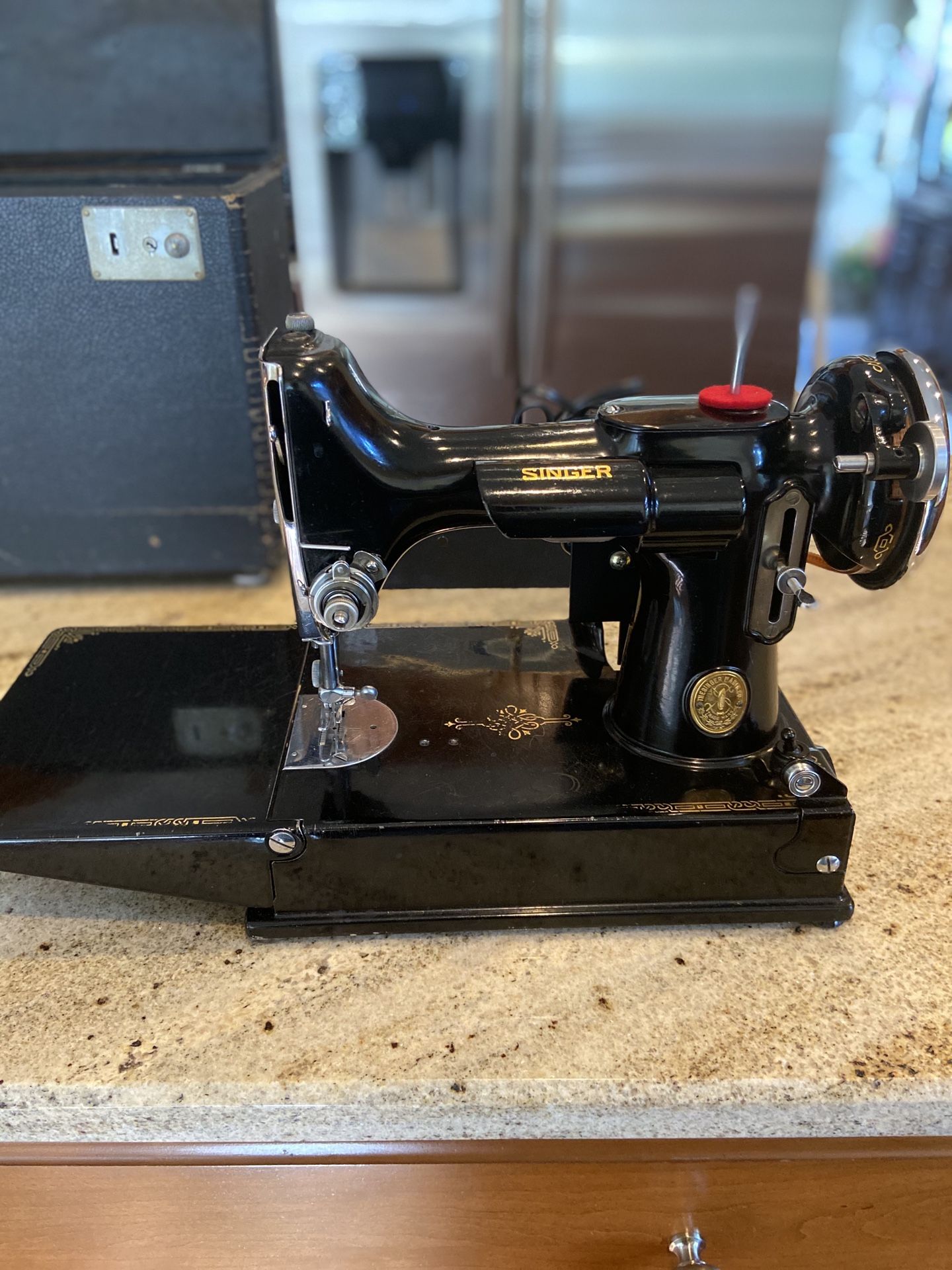 Singer Featherweight sewing machine.