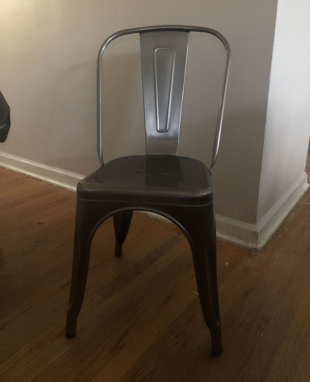 4 gunmetal stackable Chairs