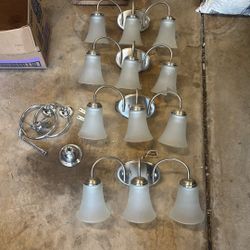 4 Light Fixtures , TP holder and 2 Towel Holders 
