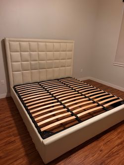 King-size white leather bed frame