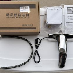 Selling an automatic faucet, brand new in the box.