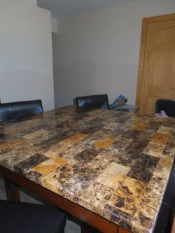 Brown dinner table for 4