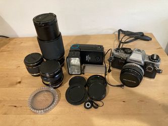 Olympus OM10 35mm Camera, additional lens,and accessories