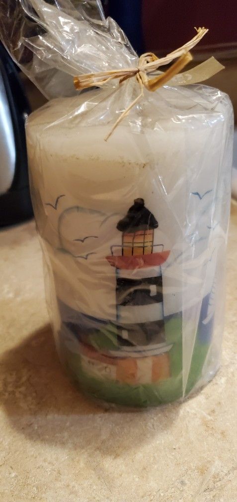 Candel Lighthouse At The Beach 