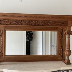 Discover the captivating charm of our Antique Wood Carving with a Mirror! This stunning piece seamlessly blends intricate craftsmanship with timeless 