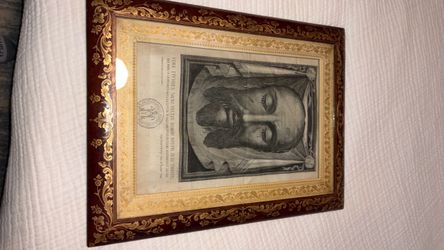 That's a "Vera Effigies" — a devotional engraving of the Holy Face of Christ, the Veil of Veronica image kept in St. Peter's Basilica. The Latin reads