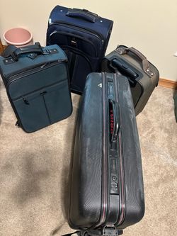 Suitcases - 4 (four) with wheels