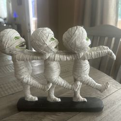 Three Mummies