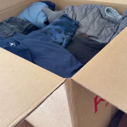 Box Of Girls And Boys Clothes