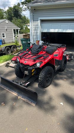 2017 Can Am outlander 450 with plow, yard cart, and 44 inch tow behind mower