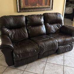 Leather power reclining sofa dark brown