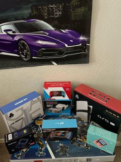 Brand New Game Consoles In Boxes