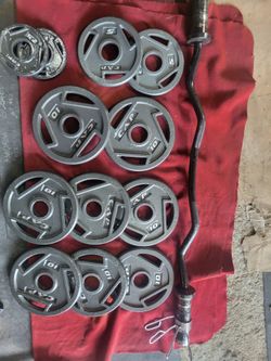 2" HOLE EZ-CURL BAR WITH 95LBSs OLYMPIC PLATES 8-10s 2-5s 2-2.5s
11525 S HALSTED/7111.S WESTERN
115$ CASH ONLY AS IS