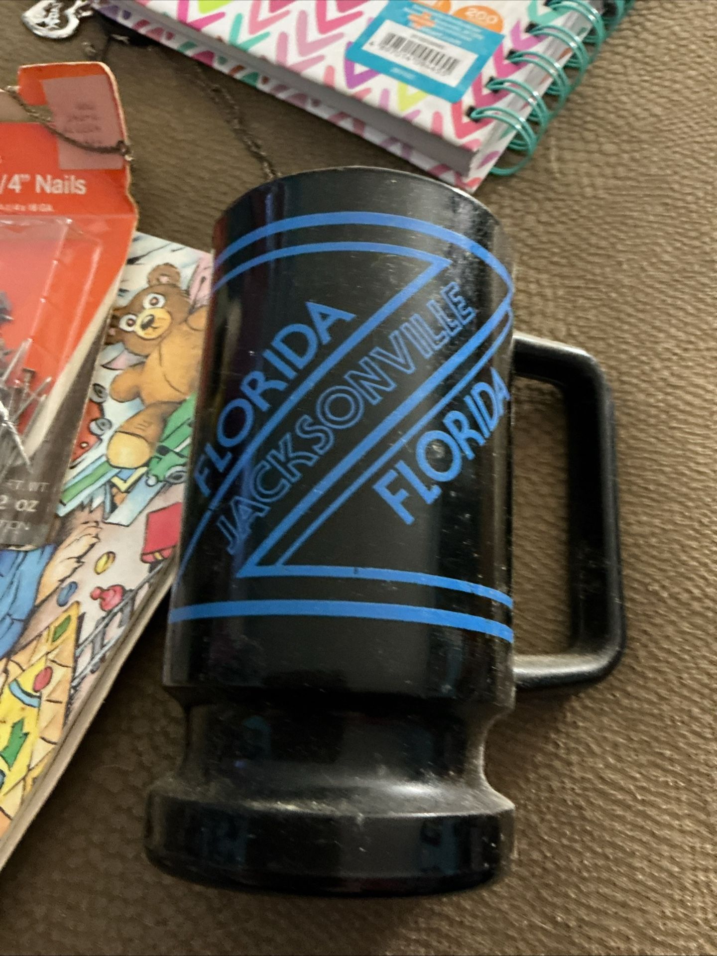 ceramic mug with blue "FLORIDA JACKSONVILLE" text