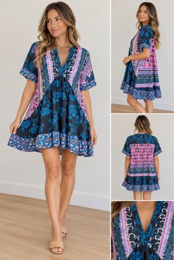 NEW DRESS-  FITS SMALL OR MEDIUM