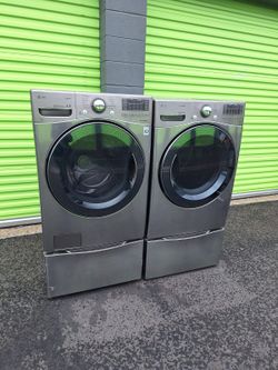 LG STEAM SET WASHER AND GAS DRYER FRONT LOAD WITH PEDESTAL STAINLESS STEEL  capacity standard