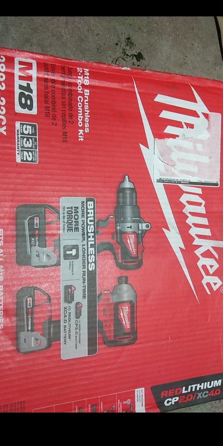 Milwaukee brushless,18 volt, impact and hammer drill combo ,two batteries bag and charger, new pick up only