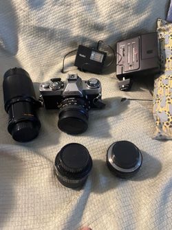 Minolta 35mm Film Camera with Lenses and Flash