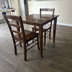 Wooden squared table with 2 chairs  $35