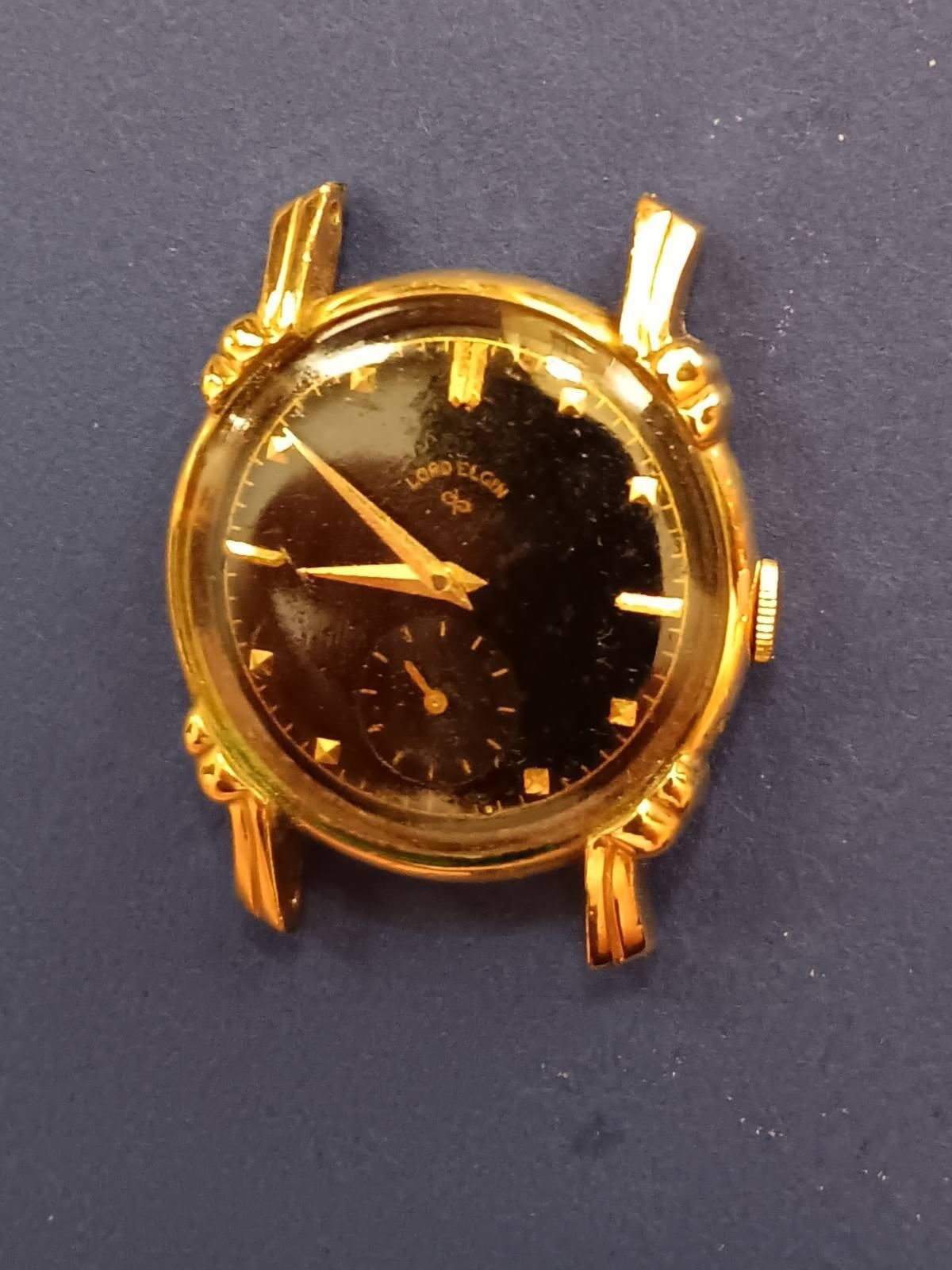 Vintage watch.  Old lord Elgin wrist watch Black Dial. Runs. 