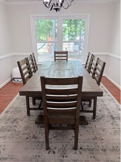 7 FT wood dining table and 8 chairs