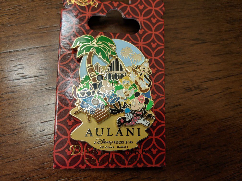 Disney Aulani resort and spa pin featuring Mickey mouse, Minnie mouse, Donald duck, Goofy and Stitch