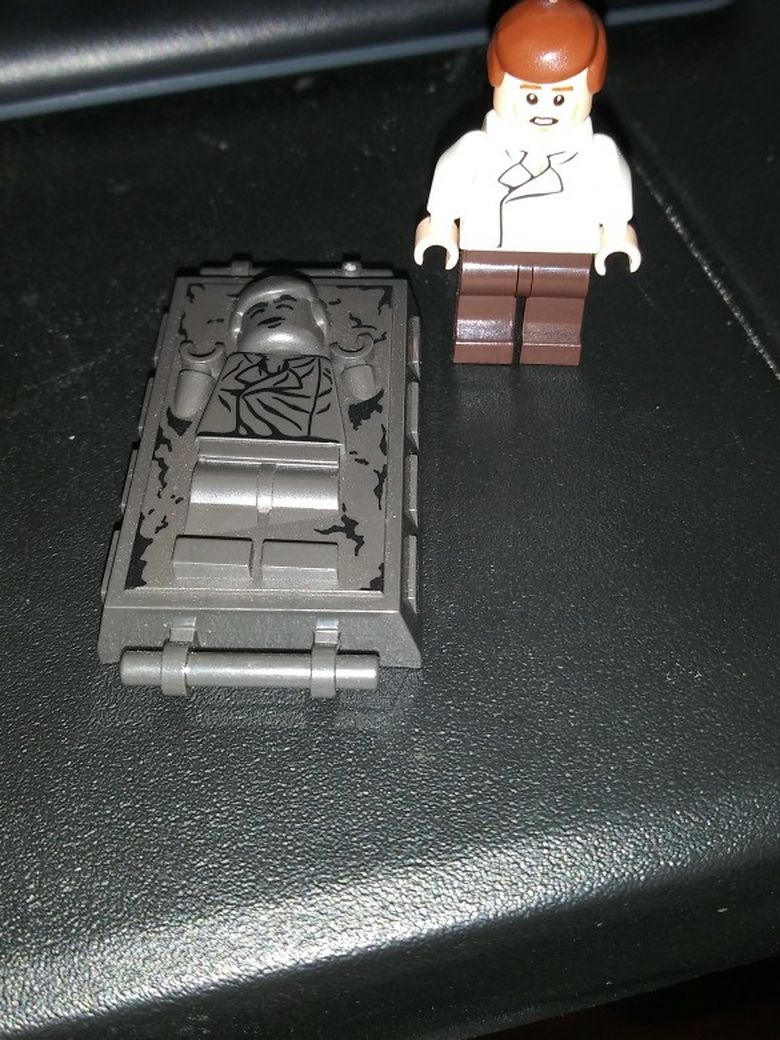 LEGO Star Wars Minifigure Han Solo, Reddish Brown Legs without Holster Pattern (Carbonite, Light Flesh, Dual Sided Head)
