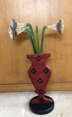 Wooden vase with flowers