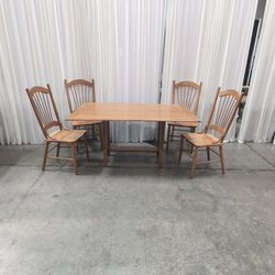 Oak Tone Drop Leaf Dining Table with Spindle Back Chairs