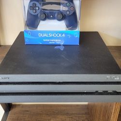 SONY  PLAYSTATION 4 PRO WITH NEW CONTROLLER