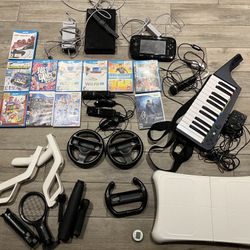 Wii U game console, accessories and game discs 
