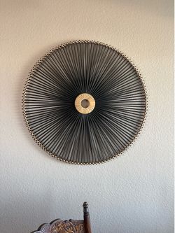 Rattan starburst wall hanging