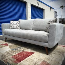 (Sold) Light Gray Tufted Mid Century Modern Sofa by Living Spaces