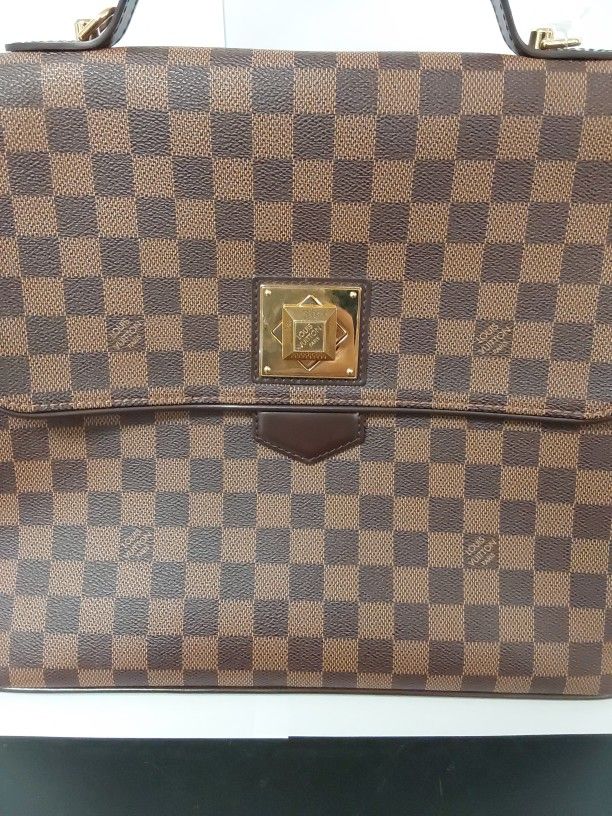 Louis Vuitton "BERGAMO" briefcase style bag.