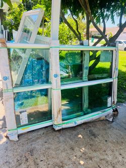 PGT Hurricane Window 52x49 each$500