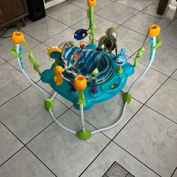Bright Starts Disney Baby Finding Nemo Sea of Activities Baby Activity Center Jumper with Interactive Toys, Lights, Songs & Sounds, 6-12 Months (Blue)