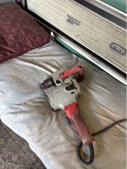 Milwaukee whole hog corded half inch drill.