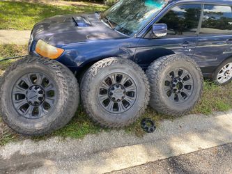 3 OEM F-250 wheels with Mickey Thompson tires