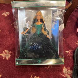 Holiday Barbie 2004 never played with still in box great condition
