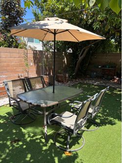 PATIO FURNITURE TABLE CHAIRS AND UMBRELLA