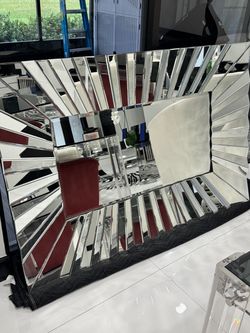 Gorgeous Regal rectangular wall mirror featuring a striking starburst-style segmented mirrored frame - Excellent Condition- Retail: $1695
