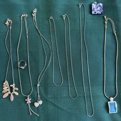 Costume Jewelry Silver Necklaces, lot of 9 pieces, 7 necklaces, 1 matching ring, 1 additional pendant, excellent condition.