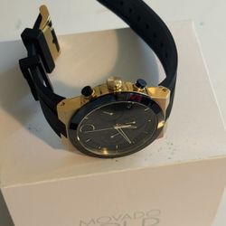 Movado Watch And 10 K Gold Diamond Earrings 