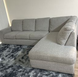 Light Gray Living Spaces L-Shape Sectional Sofa with Rightside Chaise