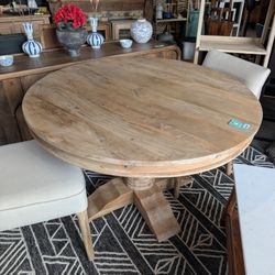 Handcrafted 48 Inch Round Wooden Pedestal Table in Natural 