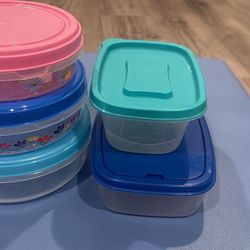 Set of Plastic Food Containers, Includes various sizes with colorful lids.