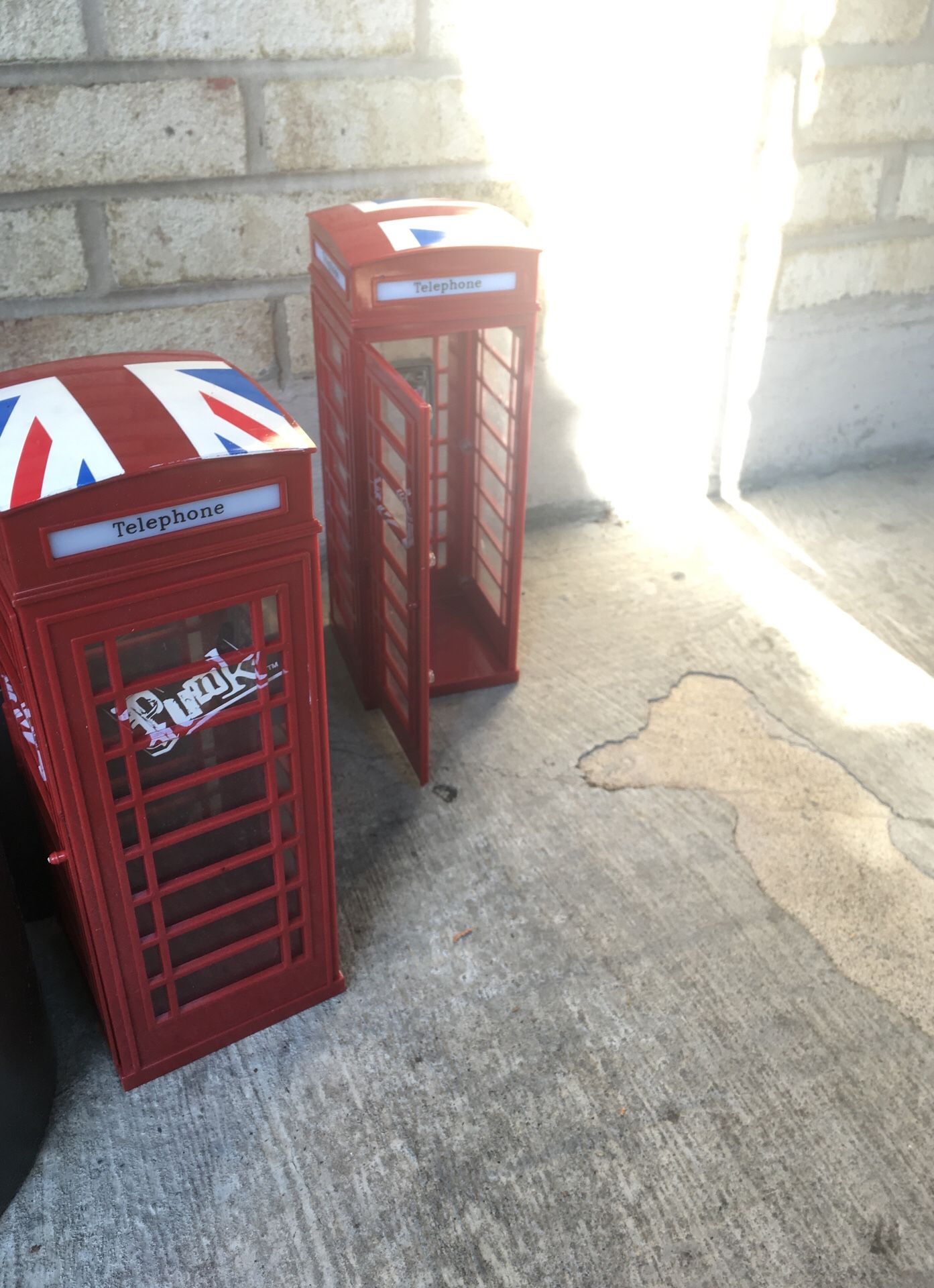 Two British Bratz telephone booths used
